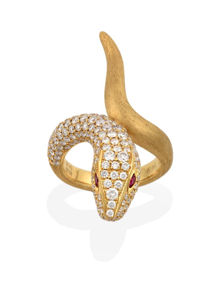 Lot 2049 - A Ruby and Diamond Snake Ring, the head pavé set with round brilliant cut diamonds and round...