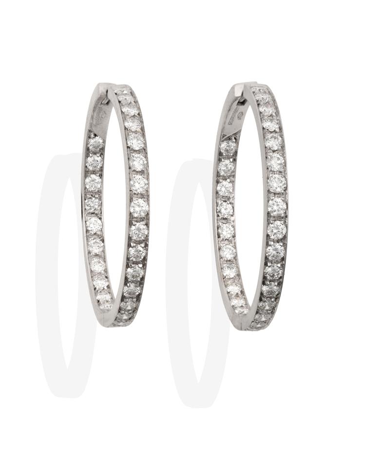 Lot 2066 - A Pair of 18 Carat White Gold Diamond Hoop Earrings, round brilliant cut diamonds set to the...
