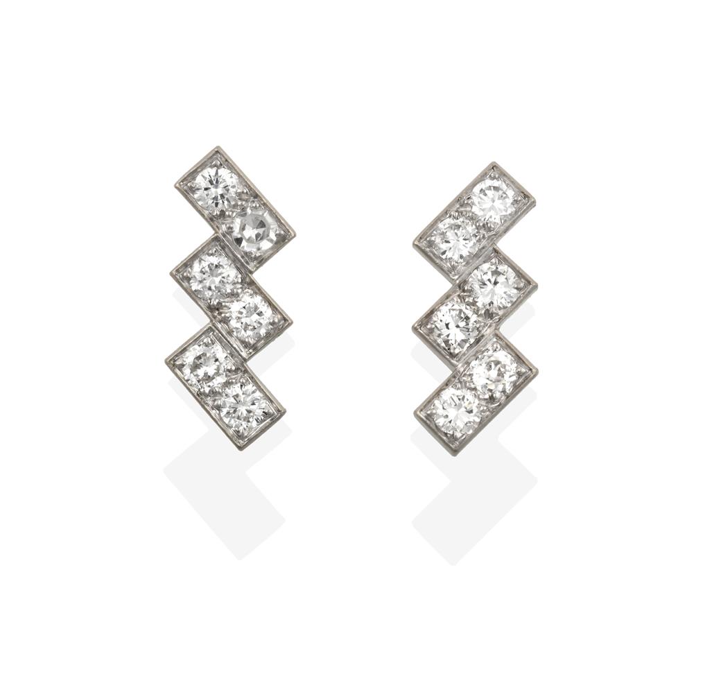 Lot 2093 - A Pair of Diamond Earrings, mounted by Cartier, three pairs of round brilliant cut diamonds...