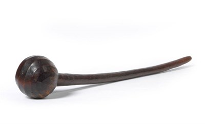 Lot 1084 - A Rhinoceros Horn Knobkerrie, Zulu, circa 1880-1900, with unusual panel carved cushion knop,...