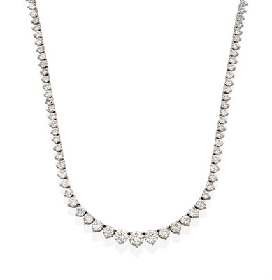 Lot 2104 - A Diamond Rivière Necklace, the graduated round brilliant cut diamonds in white claw settings,...