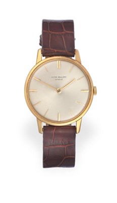 Lot 2126 - An 18 Carat Gold Wristwatch, signed Patek Philippe, model: Calatrava, ref: 2599, circa 1968,...