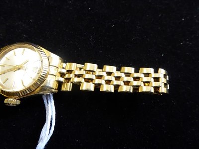 Lot 2143 - A Lady's 18 Carat Gold Automatic Centre Seconds Wristwatch, signed Rolex, model: Oyster...