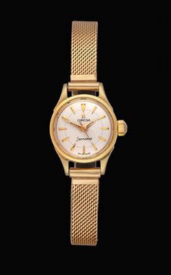 Lot 2170 - A Lady's 18 Carat Gold Centre Seconds Wristwatch, signed Omega, model: Seamaster, ref: 2878SC,...