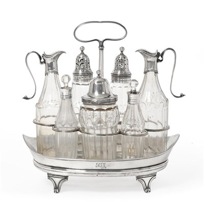 Lot 2196 - A George III Silver Condiment Set, by Robert Hennell, London, Probably 1810, oval and on four panel