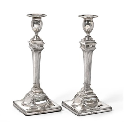 Lot 2199 - A Pair of George III Silver Candlesticks, by John Winter and Co, Sheffield 1776, each on square...