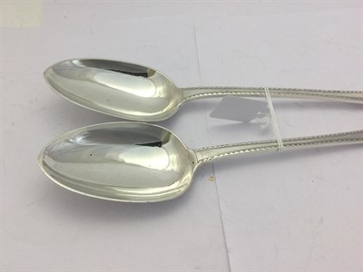 Lot 2213 - A Pair of Victorian Silver Basting-Spoons, by Henry Holland, London, 1871, single struck...