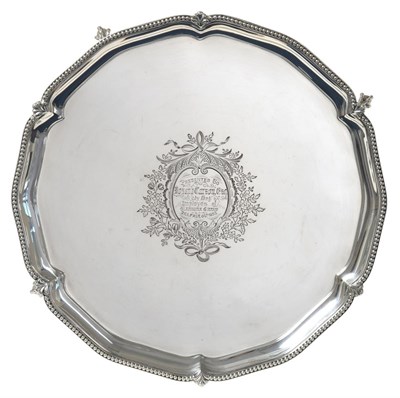 Lot 2237 - A Victorian Silver Salver, by Charles Stuart Harris, London, 1891, shaped circular and on four ball