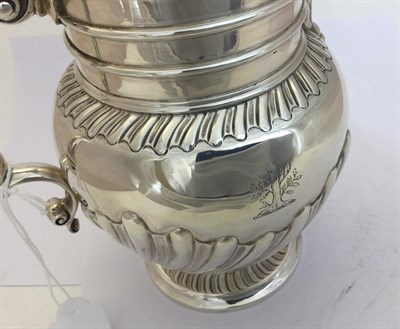Lot 2239 - A Victorian Silver Jug, by John and Frank Pairpoint, London, 1894, baluster and on spreading...