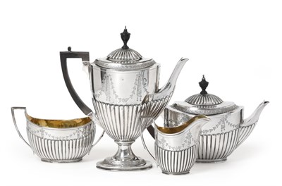 Lot 2243 - A Four-Piece Victorian Silver Tea and Coffee-Service, by Walter and John Barnard, London, The...