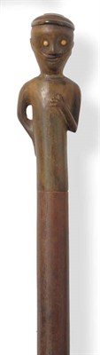 Lot 1099 - A Walking Stick, probably Rhinoceros Horn, Sudan, circa 1850, with figural handle, the pommel...