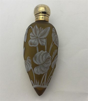 Lot 2279 - A Victorian Silver-Gilt Mounted Cameo-Glass Scent-Bottle, The Silver Mount by Sampson Mordan...