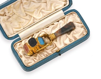 Lot 2308 - A Victorian Agate and Gilt Metal Hand-Seal, Circa 1840, the tapering agate handle terminates in...