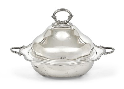 Lot 2331 - A George V Silver Muffin-Dish and Cover, by James Deakin and Sons, Sheffield, 1931, shaped circular