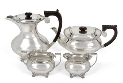 Lot 2340 - A Three-Piece George V Silver Tea-Service and an Elizabeth II Hot-Water Jug, The Tea-Service by...
