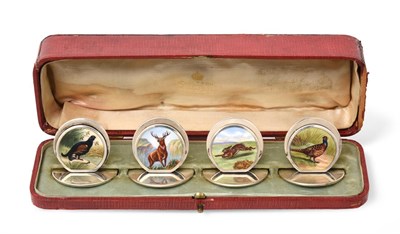 Lot 2357 - A Cased Set of Four Edward VII Silver and Enamel Place-Card Holders, by Sampson Mordan and Co.,...