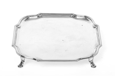 Lot 2374 - A George V Silver Waiter, by Asprey and Co. Ltd., London, 1924, shaped square and on four pad feet