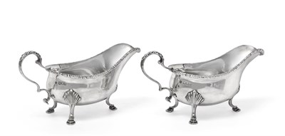 Lot 2380 - A Pair of Edward VII Silver Sauceboats, by William Hutton and Sons, London, 1901, in the George III