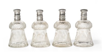 Lot 2384 - A Set of Four George V Silver-Mounted Cut-Glass Decanters, The Silver Mounts by Walter Gardener...