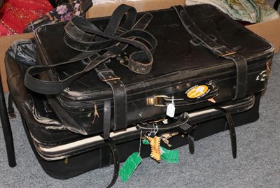 Lot 1001 - Three graduated black Tanner Krolle suitcases made for Harrods, the largest with canvas...