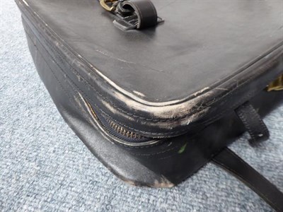 Lot 1001 - Three graduated black Tanner Krolle suitcases made for Harrods, the largest with canvas...