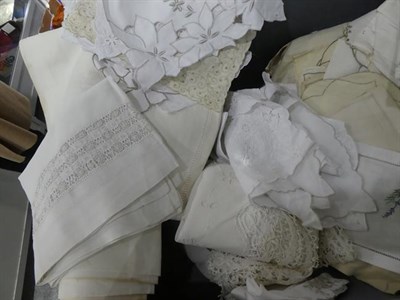 Lot 1002 - Quantity of assorted white linen, embroidered textiles, handkerchiefs, table linens in a navy...