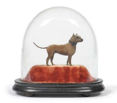 Lot 1118 - A Miniature Model of a Dog, the brown coated standing terrier-like dog wearing a collar and turning