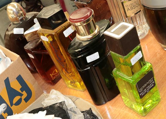 Lot 1050 - Large glass scent bottle dummy factices, comprising Colours de Benetton, Bogart pour Homme, K...