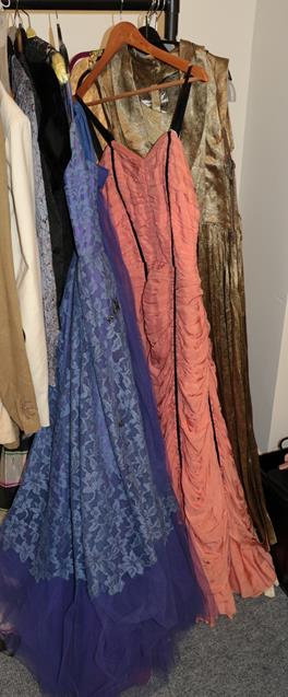 Lot 1058 - Circa 1940s and later evening dresses, including lace mounted examples, velvet dresses, mainly full