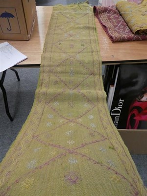 Lot 1067 - Probably Yuruk, three tribal flat weaves in green, red and yellow, hand woven geometric design