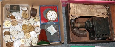Lot 1100 - A box of assorted pocket watch movements, wrist watch movements etc and a boxed Gloria EP magic...