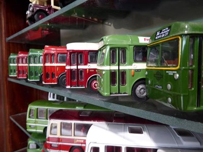 Lot 1112 - A collection of EFE buses in two collectors cabinets together with a few copycat models and a...