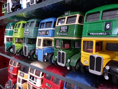 Lot 1112 - A collection of EFE buses in two collectors cabinets together with a few copycat models and a...