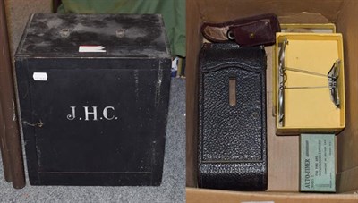 Lot 1115 - An early 20th century medicine cabinet containing bandages and a stethoscope, together with...