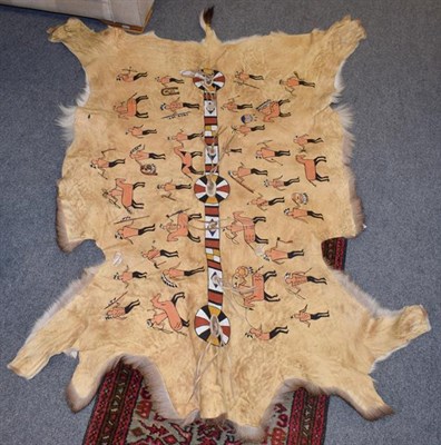 Lot 1204 - A North American deer hide with cave paintings to the reverse, 140cm by 90cm