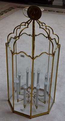 Lot 1224 - A large octagonal eight light glass and brass lantern form ceiling light, 108cm
