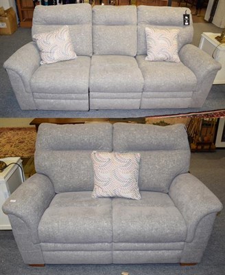 Lot 1240 - A Parker Knoll grey upholstered electric reclining three-seater settee 209cm by 87cm by 98cm...