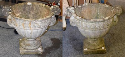 Lot 1242 - A pair of weathered composition twin-handled garden urns inscribed Papini, 51cm by 39cm by 46cm