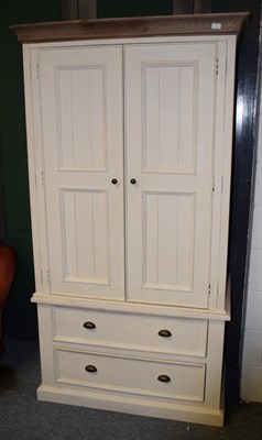Lot 1248 - A modern white painted wardrobe, 109cm by 61cm by 200cm