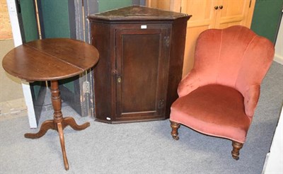 Lot 1250 - An 18th century oak hanging corner cupboard, Victorian nursing chair and a mahogany tripod...