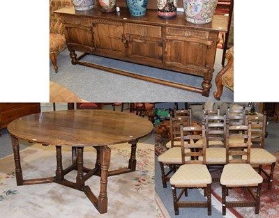 Lot 1257 - An oak dining suite in 17th century style comprising a gate leg dining table, 160cm by 160cm (open)