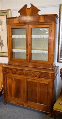 Lot 1261 - A French walnut glazed bookcase cabinet, 120cm by 47cm by 226cm