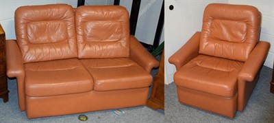 Lot 1268 - A Tetrad brown leather two-seater sofa with matching single armchair (2)
