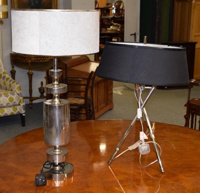 Lot 1291 - A modern silvered table lamp horse hide shade, 80cm together with another similar table lamp on...