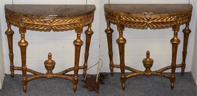 Lot 1305 - A pair of reproduction gilt wood marble topped demi-lune console tables 91cm by 41cm by 85cm of...