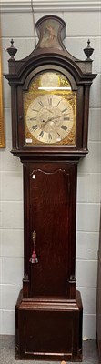 Lot 1314 - An oak eight-day longcase clock, 13'' arched brass dial with silvered chapter ring, the arch...