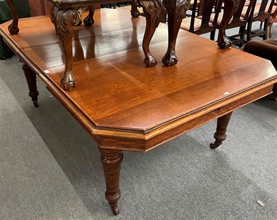 Lot 1318 - A Victorian oak wind-out dining table, with one leaf, 198cm (open) by 125cm by 73cm high