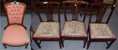 Lot 1325 - Three mahogany dining chairs with yolk crest rails and a Victorian mahogany framed nursing...