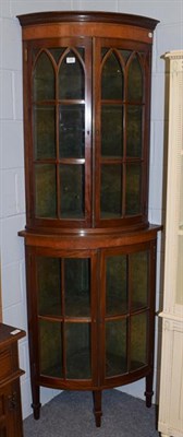 Lot 1343 - An Edwardian inlaid mahogany glazed standing corner cupboard, 75cm by 52cm by 206cm