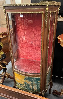 Lot 1353 - A 20th century gilt metal mounted vitrine, front door with glazed panel and landscape scene to...